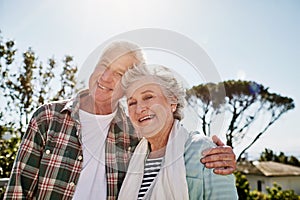 Weve kept the love alive. a happy senior couple relaxing together outdoors.