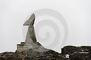 Whale tail statue located in Whale Cove