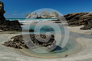 Wharariki Beach & Archway Islands in New Zealand