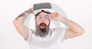 What benefits of virtual reality headset. Man bearded hipster with virtual reality headset on white background isolated