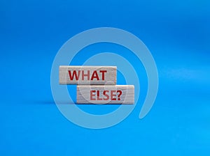 What else symbol. Concept word What else on wooden blocks. Beautiful blue background. Business and What else concept. Copy space