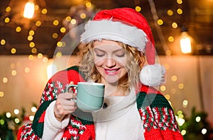 What a great morning. happy new year. Christmas. girl santa hat milk cup. xmas mood. Woman drink cocoa. Cheerful woman