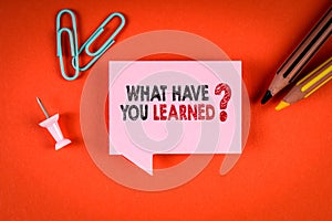 WHAT HAVE YOU LEARNED. Time To Learn Concept. Speech Bubble On Orange Background