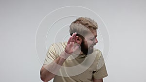 What? I can`t hear you! Deaf bearded man asking to repeat, having hearing problems, misunderstanding in communication, difficult t