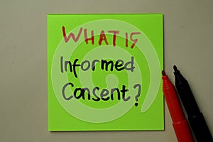 What is Informed Consent? write on sticky notes isolated on office desk