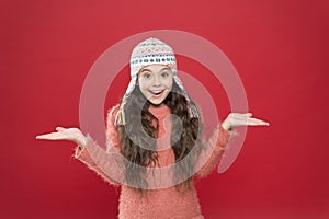 So what. Just want to have fun. Winter outfit. Cute model enjoy winter style. Small child long hair wear hat. Wintertime