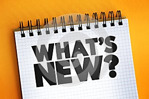 What`s New question text on notepad, concept background