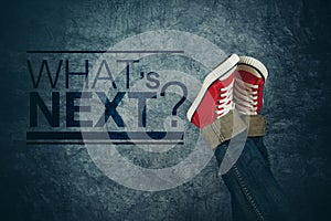 What`s next concept, with young person in casual sneakers photo