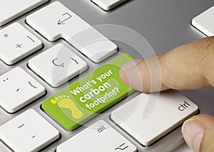 What`s your carbon footprint? - Inscription on Green Keyboard Key