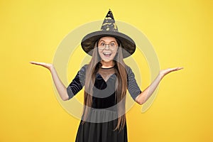 what a surprise. carnival costume party. trick or treat. celebrate the holidays. wizardry. halloween witch girl. happy photo