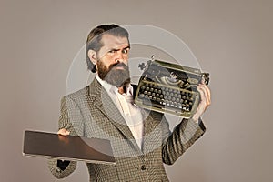 What to choose. mature man hold vintage device. first draft. professional typist make notes. modern and old technology