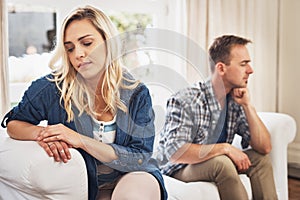 What was said cant be unsaid. Shot of a young couple having relationship problems at home.