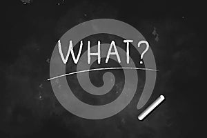 What ? written with chalk on blackboard icon logo design vector illustration