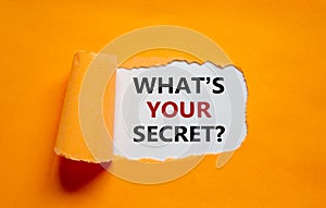 What is your secret symbol. The text `What is your secret` appearing behind torn orange paper. Business and what is your secret