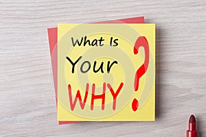 What is your why written on note concept photo