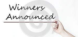 Whatever hand writing word Winners Announced black marker