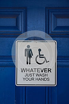 Whatever just wash your hands sign on bathroom door