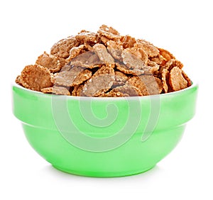 Wheat bran breakfast cereal in a bowl isolated on white background