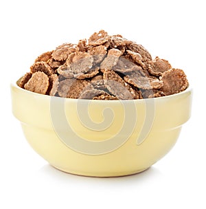 Wheat bran breakfast cereal in a bowl isolated on white background