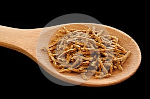 Wheat Bran Cereal on Wooden Spoon