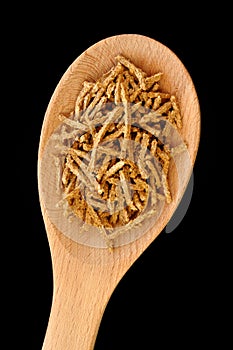 Wheat Bran Cereal on Wooden Spoon