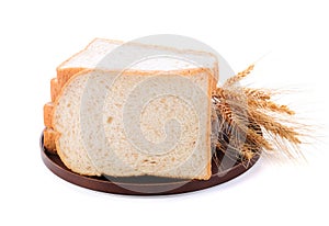 Wheat bread and grains and ears