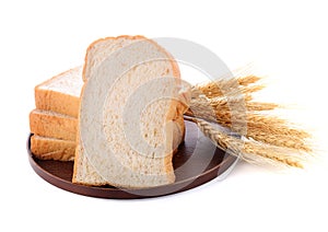 Wheat bread and grains and ears