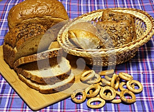 Wheat bread products are on blue tartan