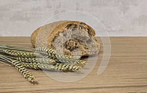 A wheat bread and shock of wheat