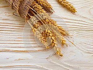 Wheat ear on wooden background frame summer photo