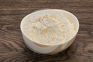 Wheat flour heap in the bowl