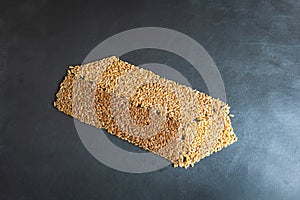 wheat grain gold bar shape concept overhead view