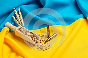 Wheat Grain in Ukraine with flag. Concept of food supply crisis and global food scarcity