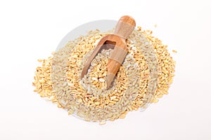 Wheat grain and wooden spoon