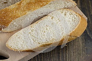 wheat loaf of bread close-up on the table