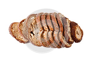 Wheat rye sliced bread with growing mold. Spoiled sliced loaf of bread closeup isolated on white background. Food waste