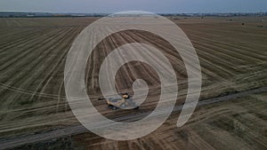 Wheat threshing combine in the field. Advanced technology for harvesting grains 4k