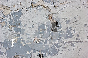 Wheathered concrete wall with great number of cracks