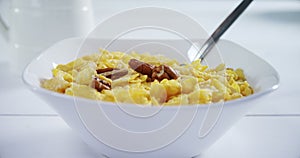 Wheaties cereal with spoon in a bowl 4k