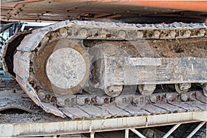 Wheel Backhoe on a drawbar trailer.