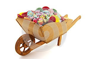 Wheel barrow full with candy