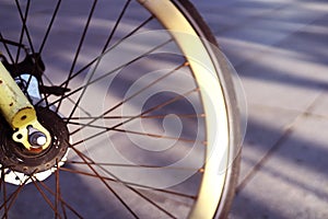 wheel of bicycle in the park with lighting bokeh background and inspiraiton