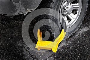 Wheel Boot or Tire Lock for Illegal Parking Violation Immobilize Vehicle Car