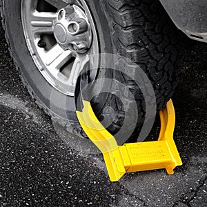 Wheel Boot or Tire Lock for Illegal Parking Violation Immobilize Vehicle Car