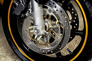 Wheel, brake discs of sport motorcycle close-up