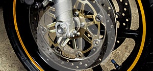Wheel, brake discs of sport motorcycle close-up