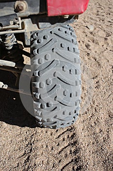 Wheel car tire and print on sand dune in the desert, Egypt