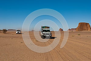 4wheel cars driving through the Sahara desert, Chad.