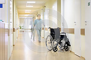 Wheel chair at corridor of hospital.