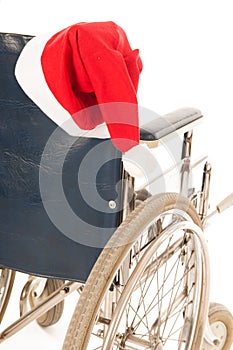 Wheel chair with hat Santa Claus